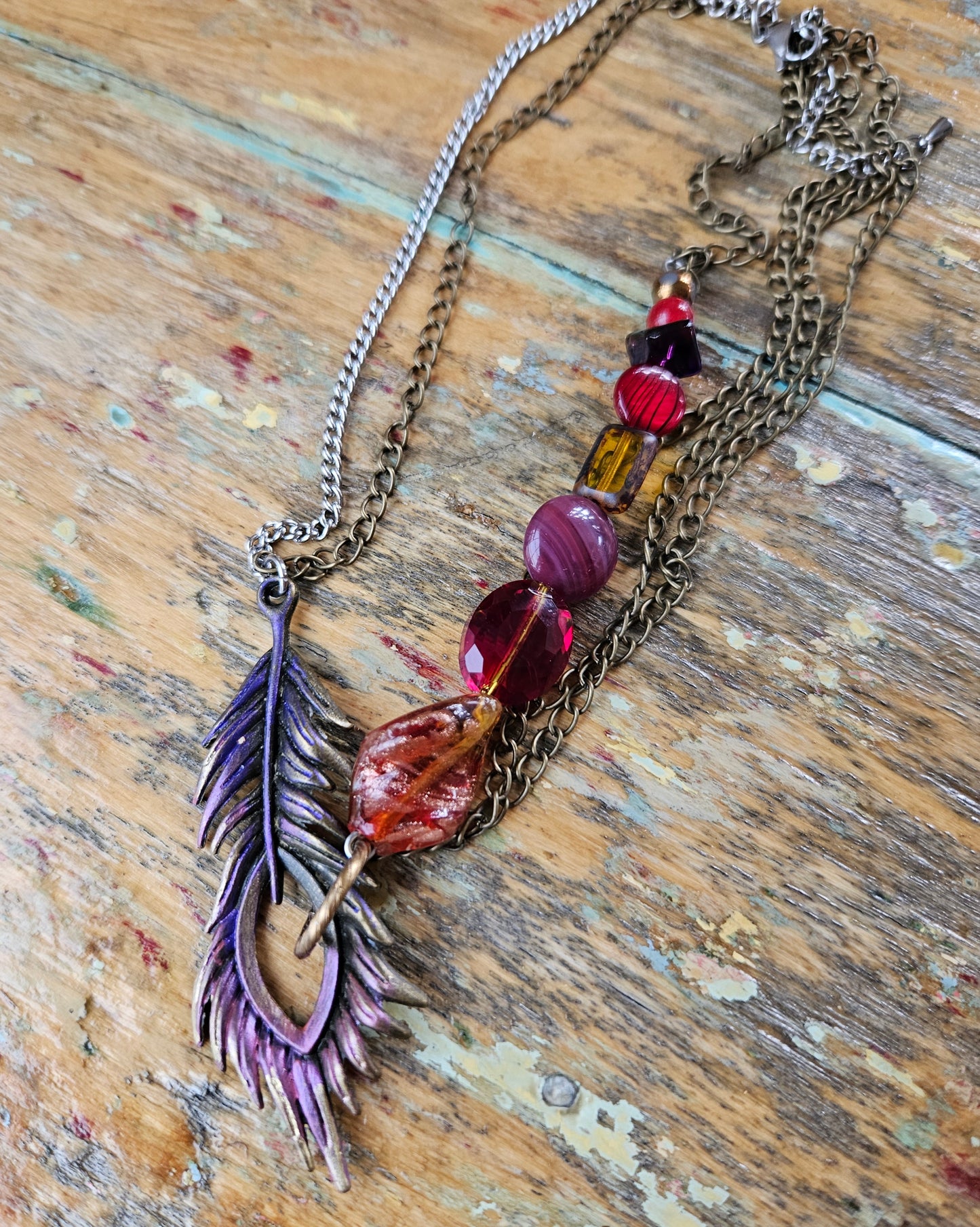 Collier Peakaboo rouge et mauve