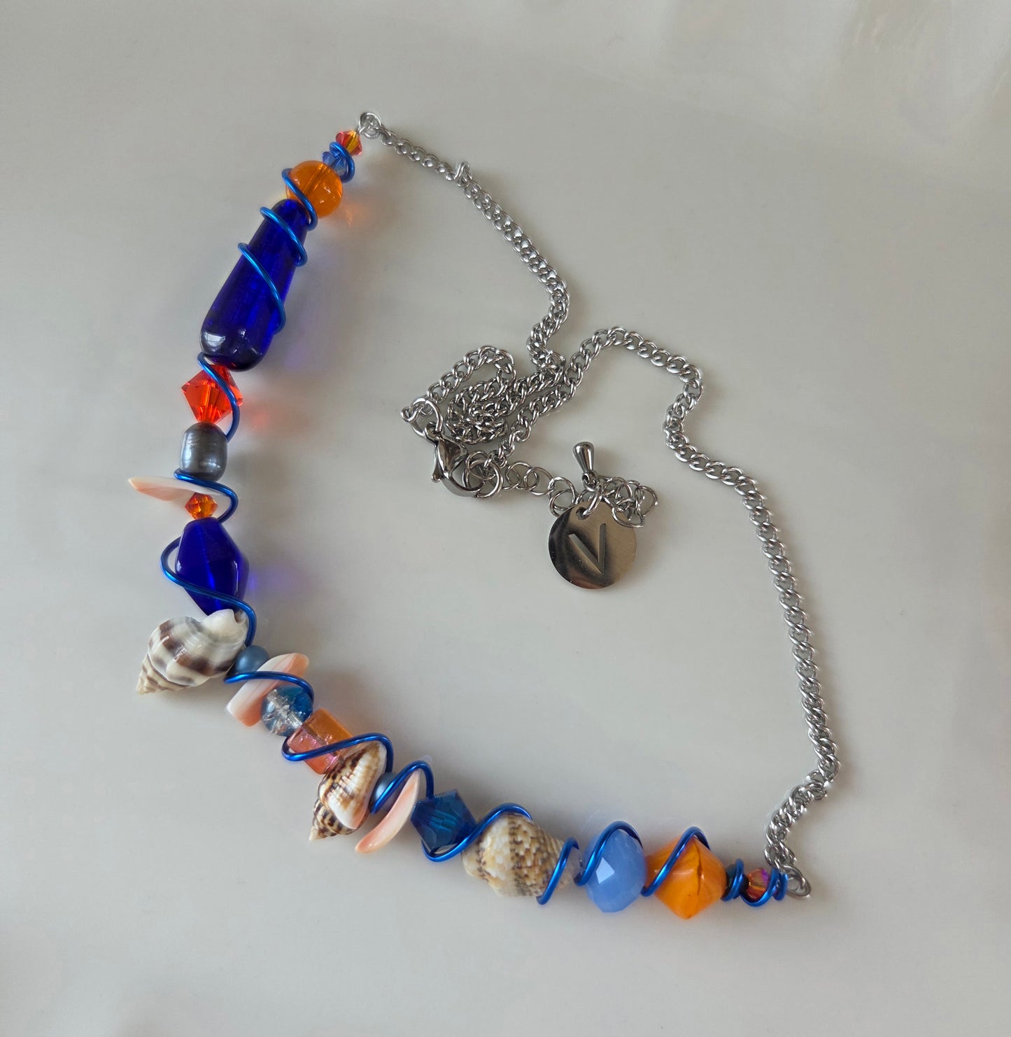 Collier Aventure orange et bleu
