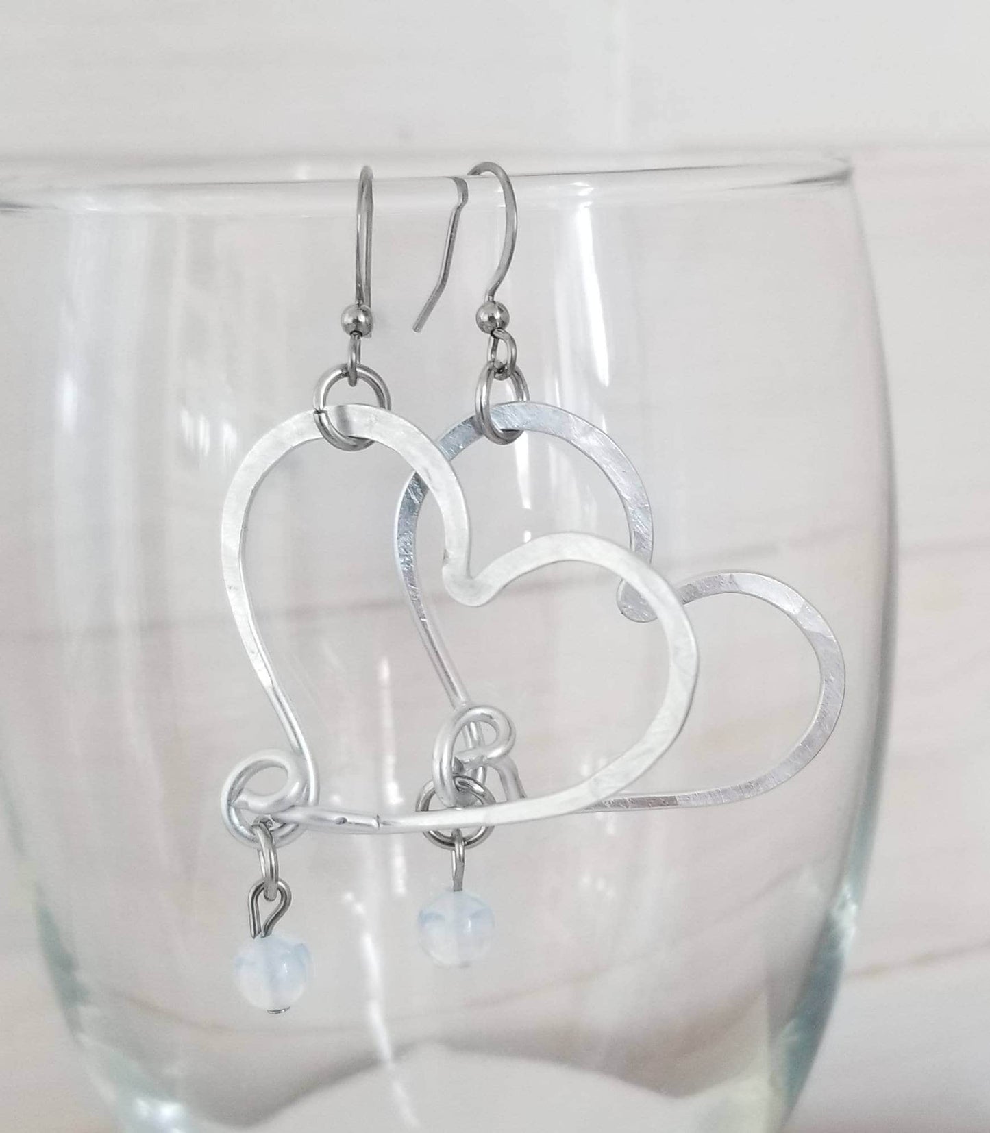 Boucles Coeur de Vlimeuse, aluminium martelé